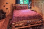 Upper level queen size bed with private bath